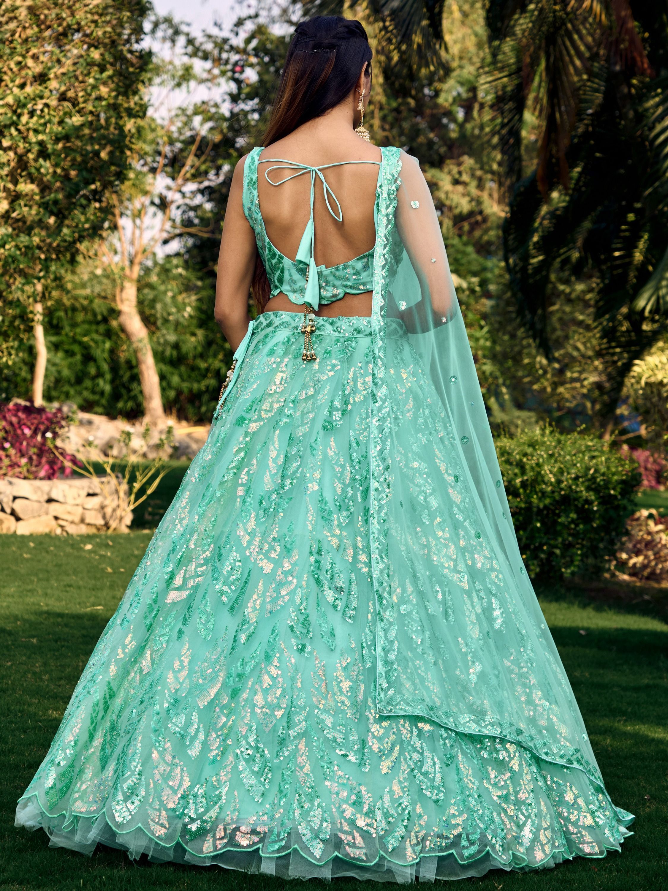Turquoise Soft Net Lehenga Choli with Heavy Multi Sequins Embroidery and Lace Border Dupatta Perfect for Weddings and Glam Parties